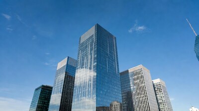 Modern glass skyscrapers against blue sky