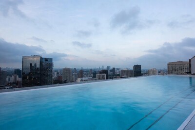 Infinity pool overlooking city skyline