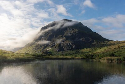 Misty Buachaille Etive Mor mountain over loch