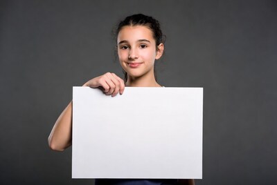 Girl holding blank white sign