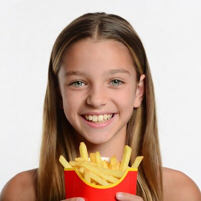Girl holding McDonalds fries