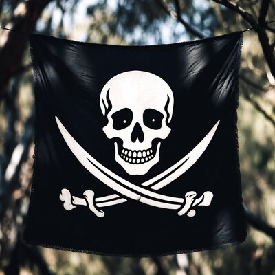 Jolly Roger flag hanging in trees