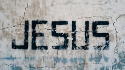 Jesus Graffiti on Cracked Wall