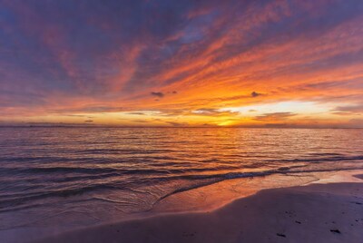 Vibrant sunset over ocean beach