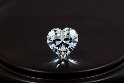 Heart-Shaped Diamond on Black Stand