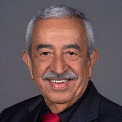 Smiling elderly man in suit