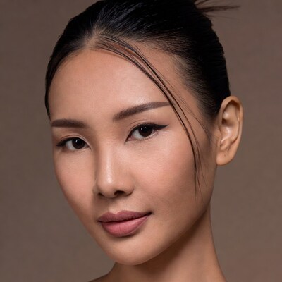 Asian woman with bun hairstyle