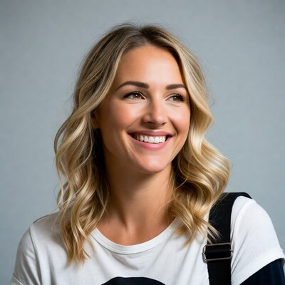 Smiling blonde woman with backpack