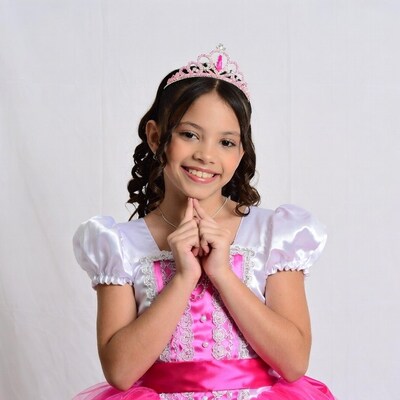 Girl in pink princess dress with tiara