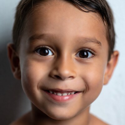 Smiling young boy close-up