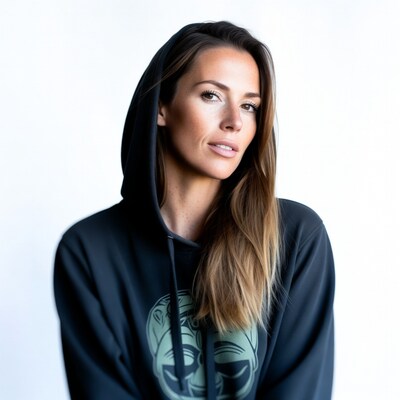Woman in black hoodie with skull print