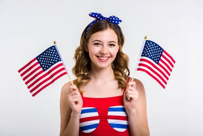 Smiling girl holding American flags