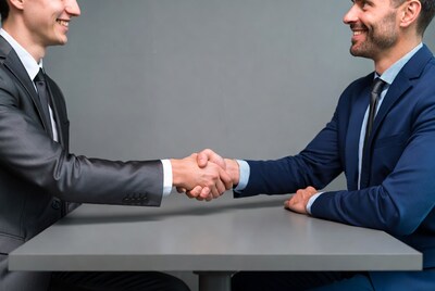 Two businessmen shaking hands