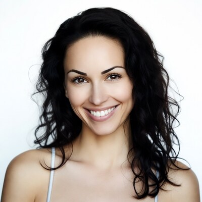 Smiling woman with wavy black hair