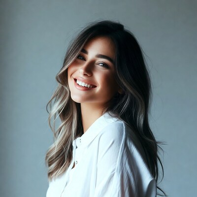 Smiling woman with balayage hair