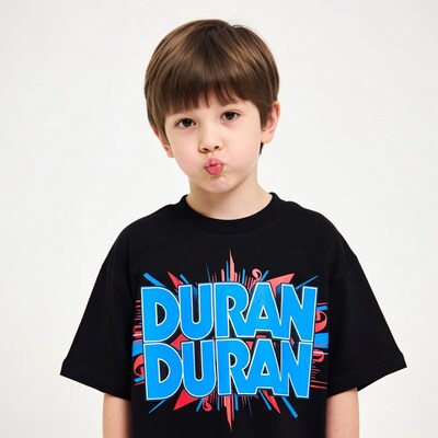 Boy puckering lips in Duran Duran t-shirt