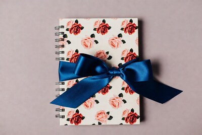 Rose Pattern Notebook with Blue Ribbon