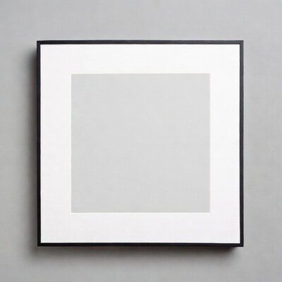 Empty black picture frame on gray wall