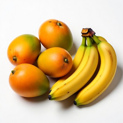 Fresh Mangoes and Bananas on White Background