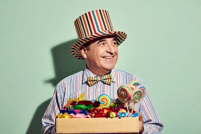 Man holding candy box with top hat