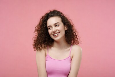 Smiling woman with curly hair