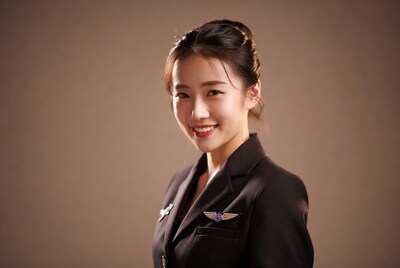 Asian flight attendant smiling