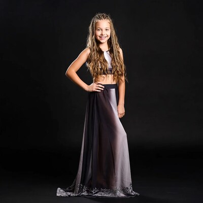 Girl with braids in flowing gown