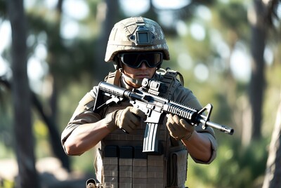 Soldier aiming rifle in forest