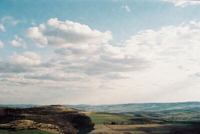 Rolling Hills Landscape with Clouds