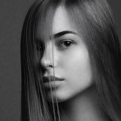 Woman with hair over face