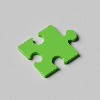 Green puzzle piece on gray background