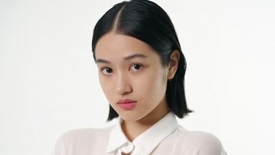 Asian woman in white shirt