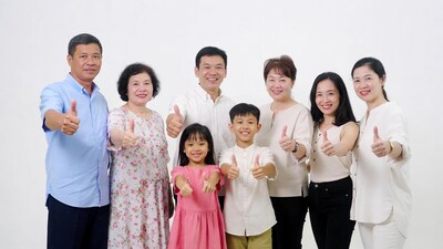 Asian family giving thumbs up