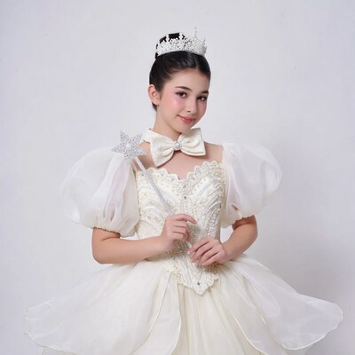 Asian girl in white fairy costume