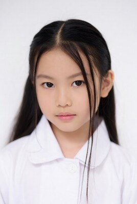 Asian girl in white school uniform