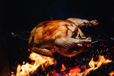 Roast Chicken on Spit over Fire