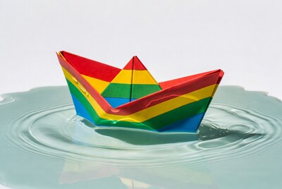 Rainbow Origami Boat in Water