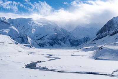 Snowy Mountains with Winding River