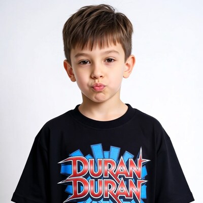 Boy pouting in Duran Duran t-shirt