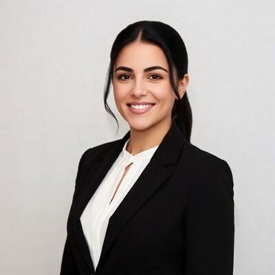 Smiling woman in black blazer suit