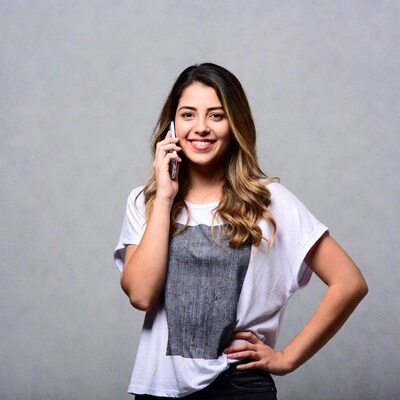 Smiling woman talking on phone