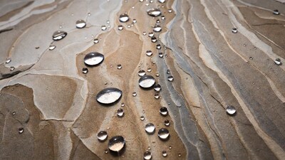 Water droplets on textured stone