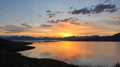 Sunset over lake and mountains