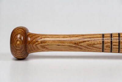 Wooden baseball bat with black stripes
