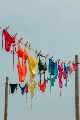 Colorful Bikinis Hanging on Clothesline