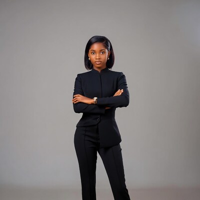African-American woman arms crossed suit