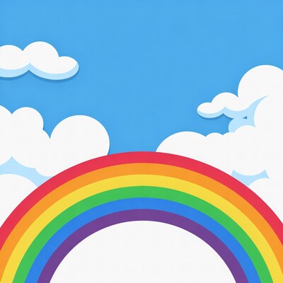 Rainbow over blue sky with clouds