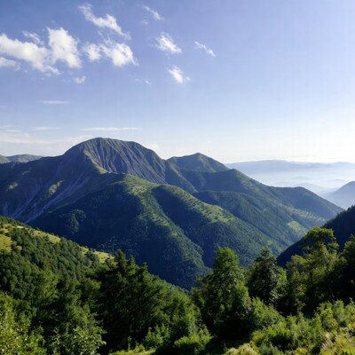 Green Mountain Range Under Blue Sky