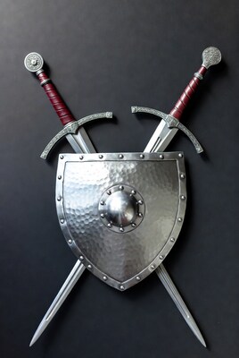 Crossed Swords Behind Medieval Shield