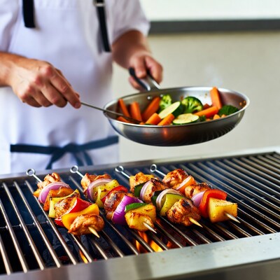 Chef grilling chicken veggie skewers